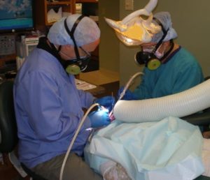 Dentist safely performing mercury filling removal in Westchester County, NY.